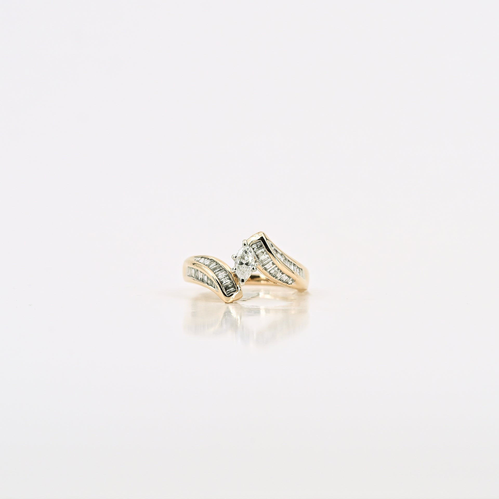 0.23 CT Marquise Diamond Ring in 14K Yellow Gold
