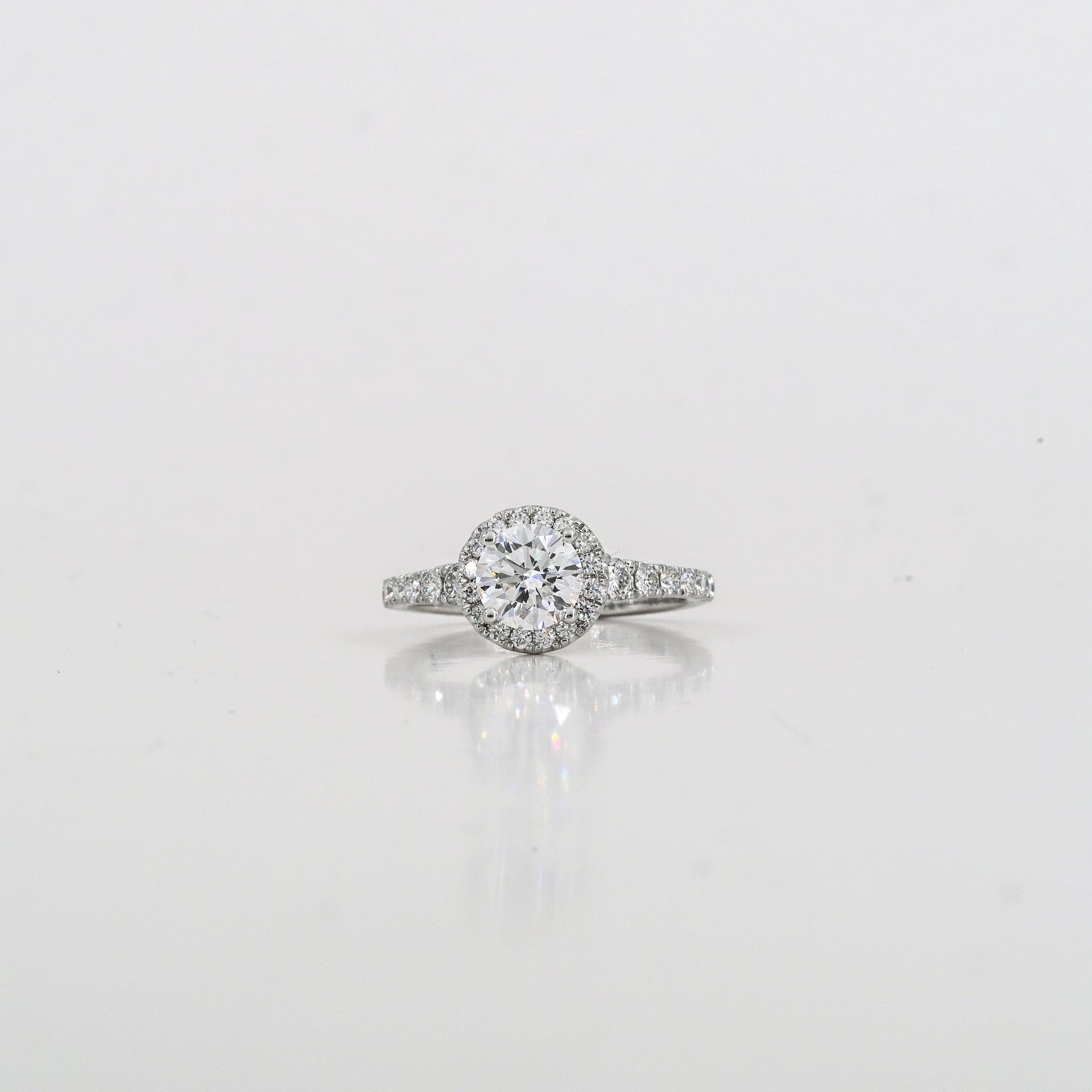 1.49 CTW Diamond Halo Ring in 18K Gold