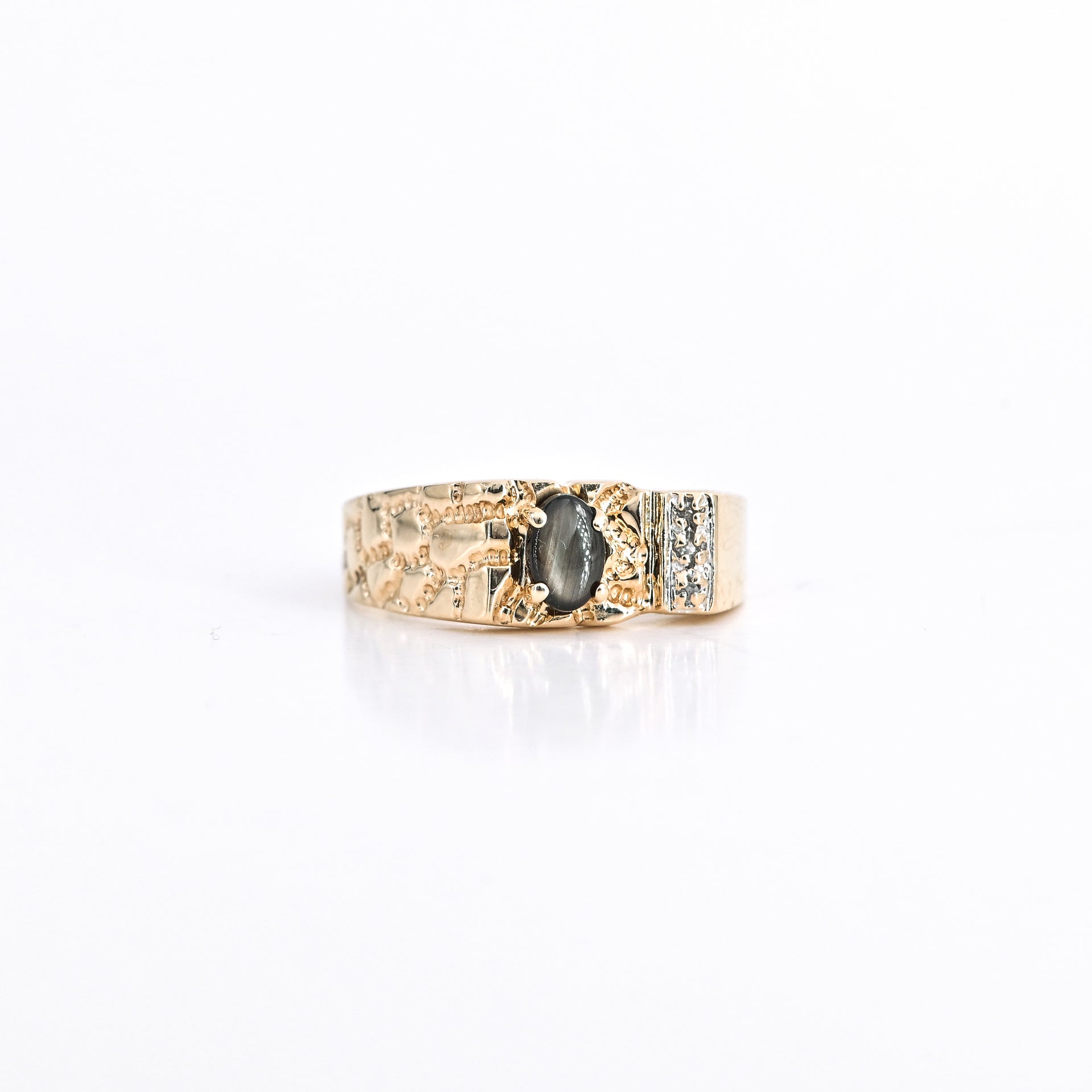 0.85 CT Oval Black Star Sapphire Ring in 14K Yellow Gold