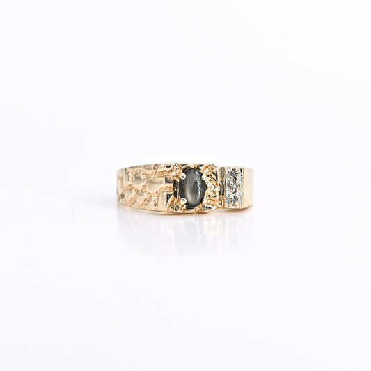 0.85 CT Oval Black Star Sapphire Ring in 14K Yellow Gold