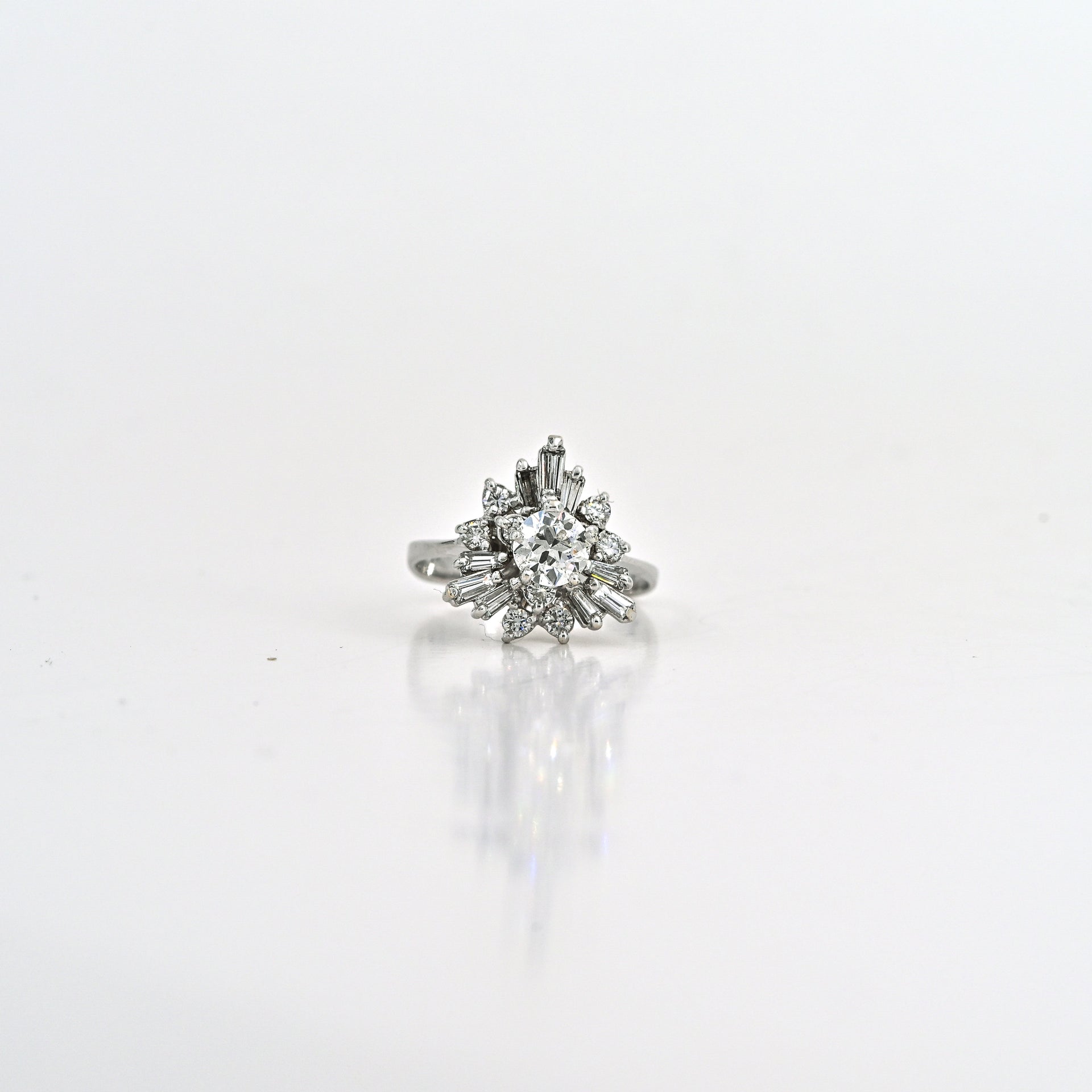 1.19 CTW Natural Diamond Ring in 18K White Gold – 0.56 CT SI1 Center